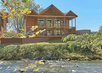 a river retreat cabin sleeps 12